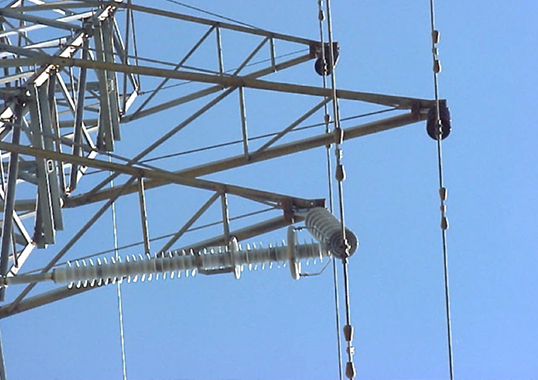 Spiral vibration dampers dissipate mechanical energy